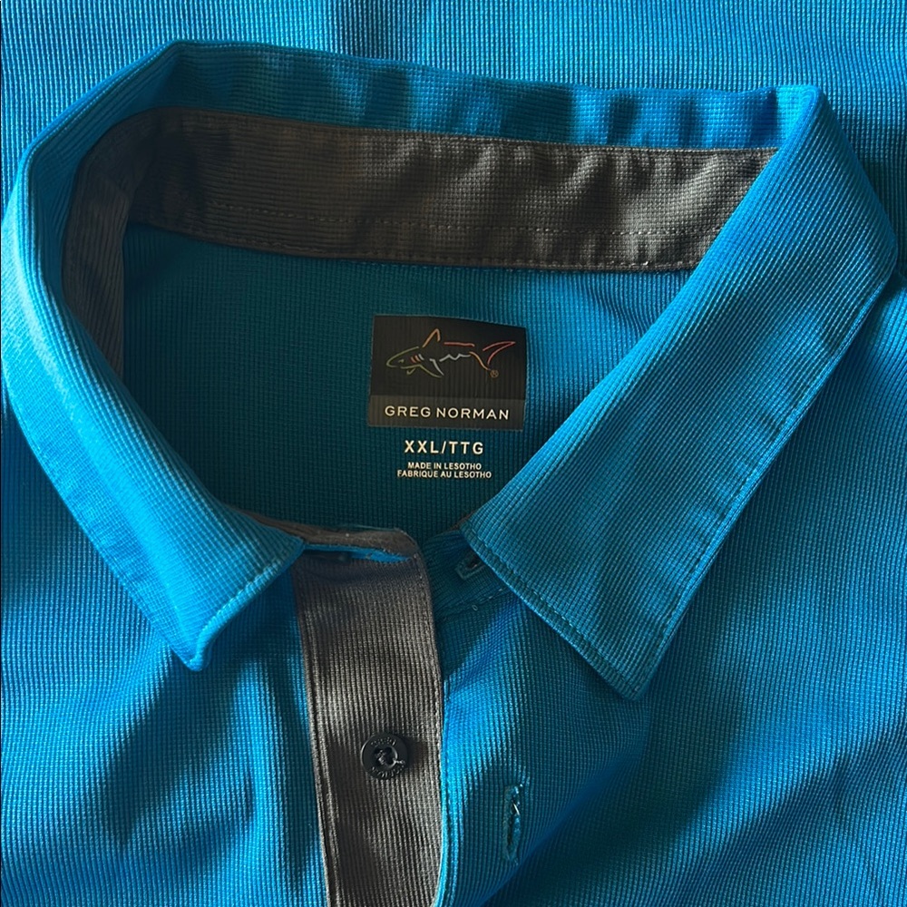 Majestic Royal Blue Greg Norman Men's Golf Shirt - The Tribute